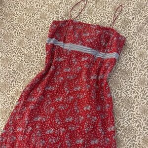 Vintage red floral spaghetti strap dress with blue bow detailing. Size 10P